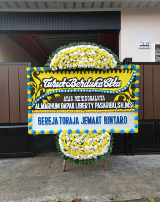 Papan Bunga Duka di Kuta
