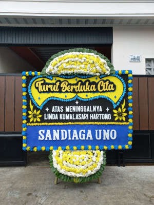 Papan Bunga Duka di Kuta